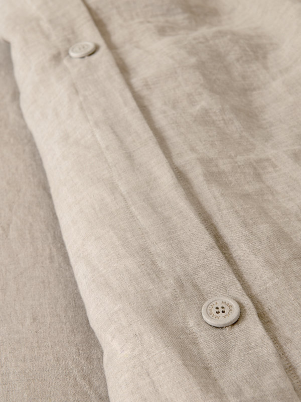 Detail of 100% Biodegradable buttons of Marialma's Natural Hemp Duvet Cover