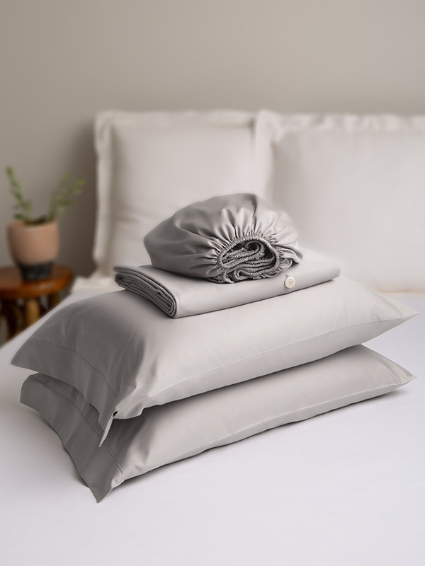 Marialma's Grey Sensitive Zinc Duvet Cover Set on top of a bed