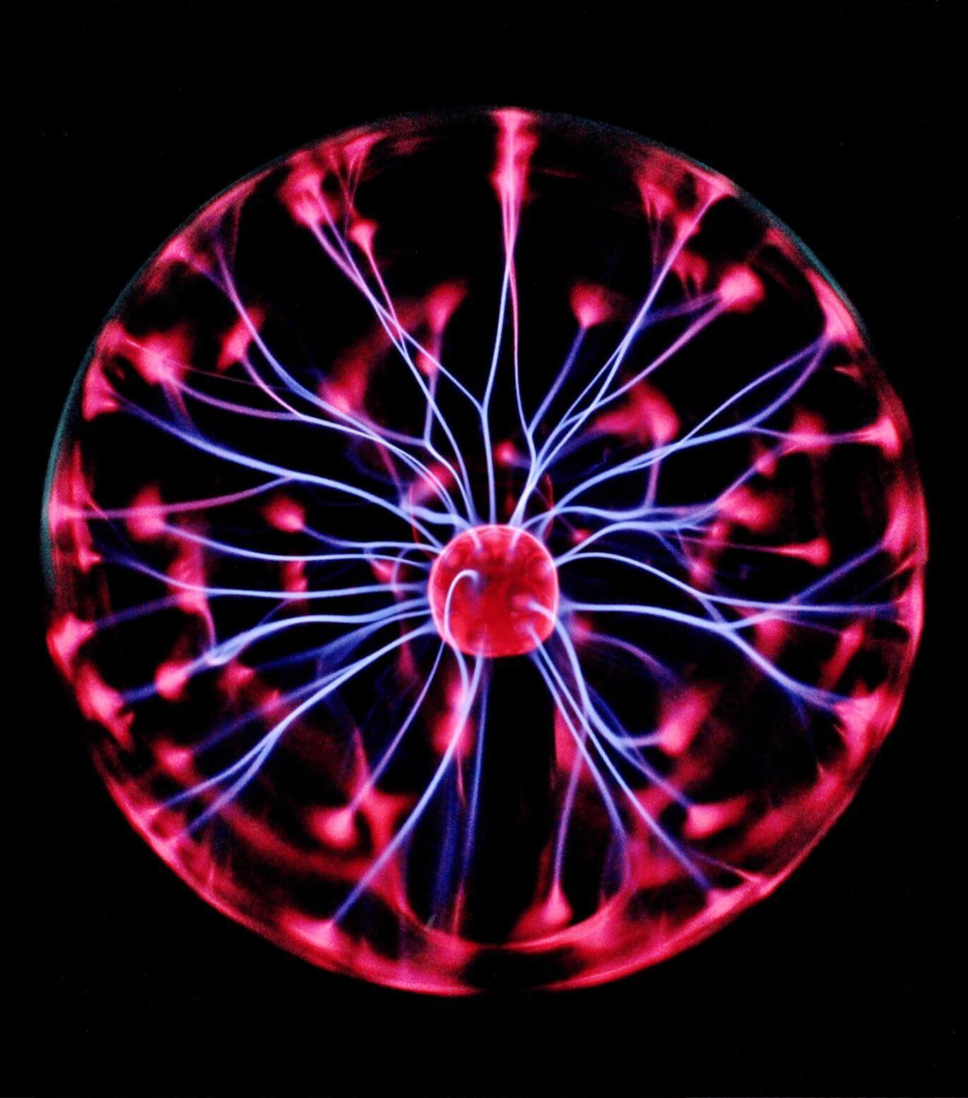 Pink and purple plasma ball in a black background